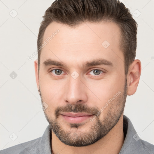 Neutral white young-adult male with short  brown hair and brown eyes