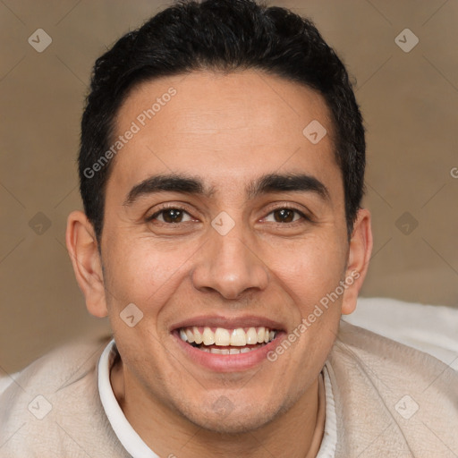 Joyful white young-adult male with short  black hair and brown eyes