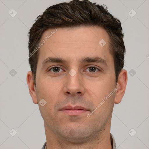 Neutral white young-adult male with short  brown hair and grey eyes