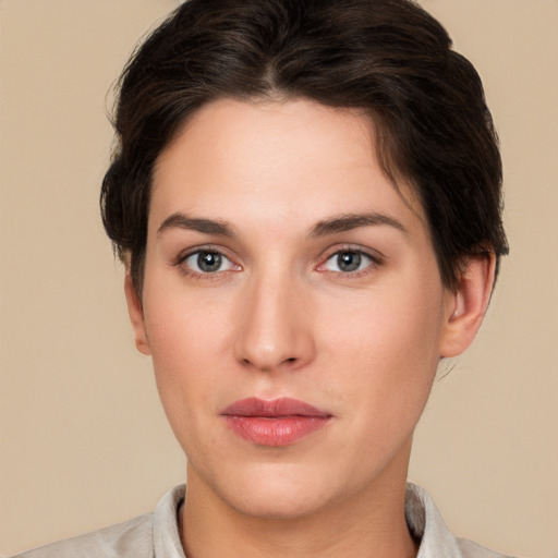 Neutral white young-adult female with short  brown hair and brown eyes