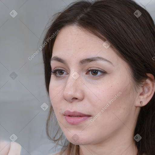 Neutral white young-adult female with medium  brown hair and brown eyes