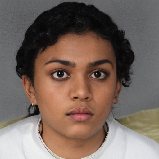 Neutral latino child female with short  black hair and brown eyes