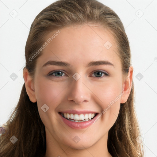 Joyful white young-adult female with long  brown hair and blue eyes