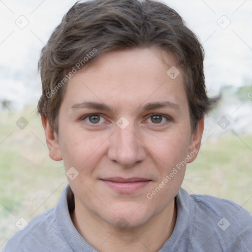 Joyful white adult female with short  brown hair and grey eyes