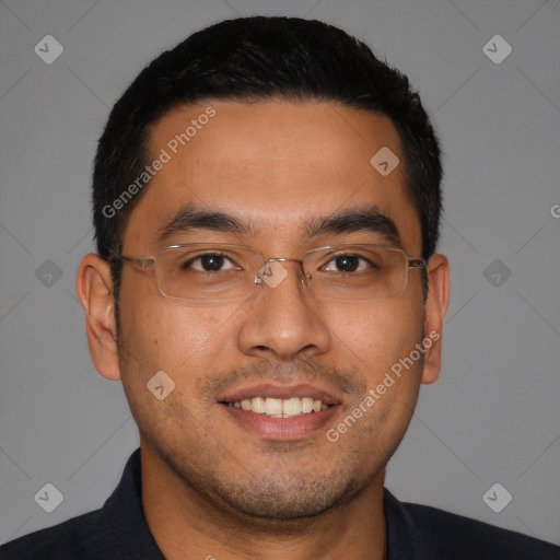 Joyful latino young-adult male with short  black hair and brown eyes