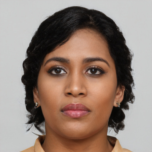 Neutral latino young-adult female with long  black hair and brown eyes