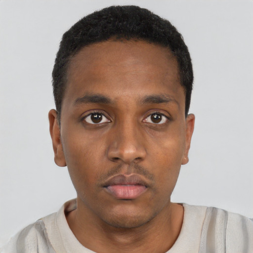 Neutral black young-adult male with short  black hair and brown eyes