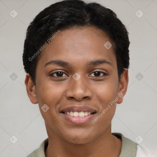 Joyful black young-adult female with short  brown hair and brown eyes