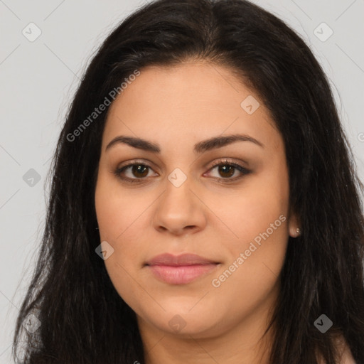 Joyful latino young-adult female with long  brown hair and brown eyes