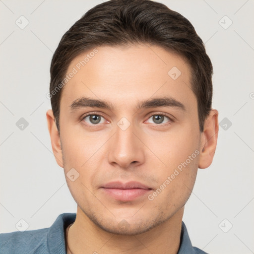 Neutral white young-adult male with short  brown hair and brown eyes