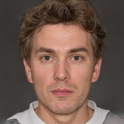 Neutral white adult male with short  brown hair and brown eyes