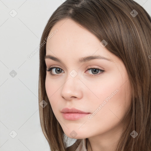 Neutral white young-adult female with long  brown hair and brown eyes