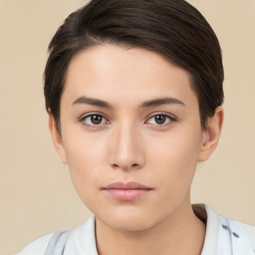 Neutral white young-adult female with short  brown hair and brown eyes