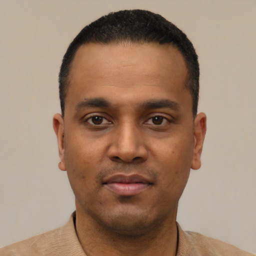 Neutral black young-adult male with short  black hair and brown eyes