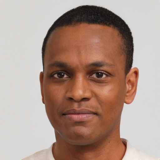 Neutral black young-adult male with short  brown hair and brown eyes