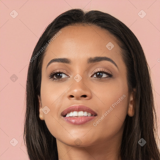 Joyful white young-adult female with long  black hair and brown eyes