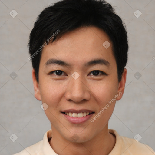 Joyful asian young-adult male with short  black hair and brown eyes