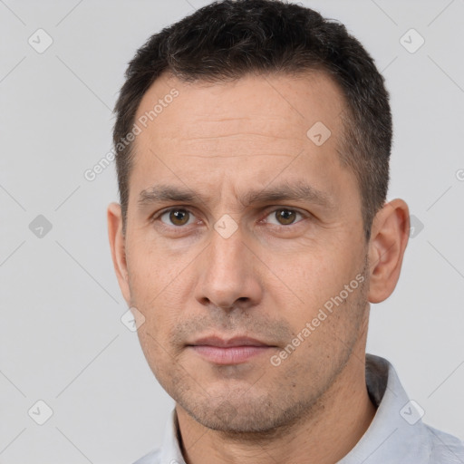 Neutral white adult male with short  brown hair and brown eyes