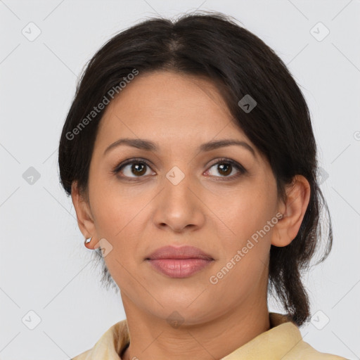 Joyful white adult female with medium  brown hair and brown eyes