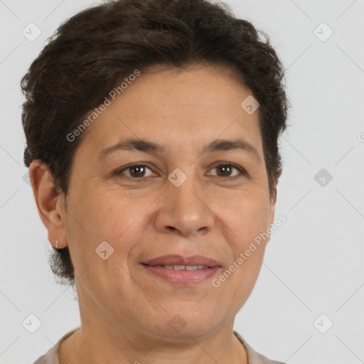 Joyful white adult female with short  brown hair and brown eyes