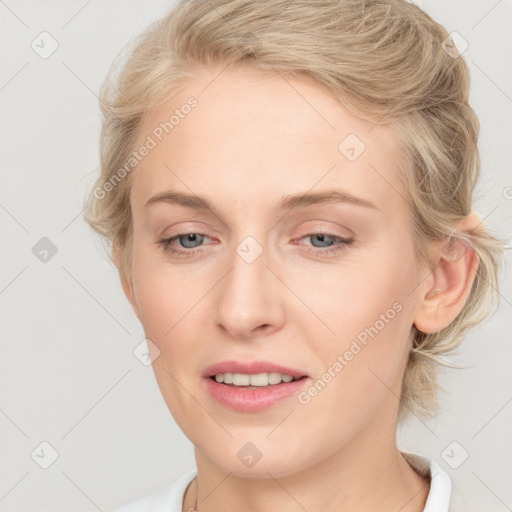 Joyful white young-adult female with medium  brown hair and blue eyes