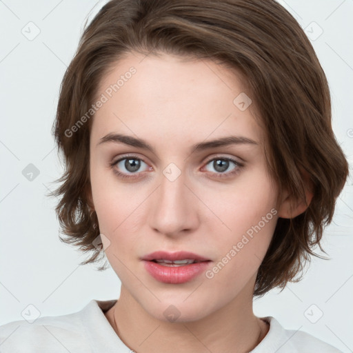 Neutral white young-adult female with medium  brown hair and brown eyes