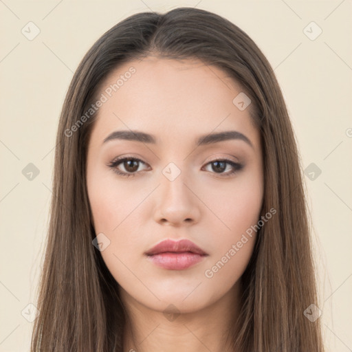 Neutral white young-adult female with long  brown hair and brown eyes