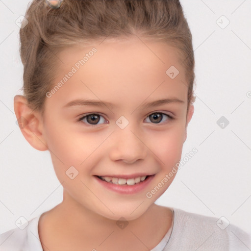 Joyful white child female with short  brown hair and brown eyes