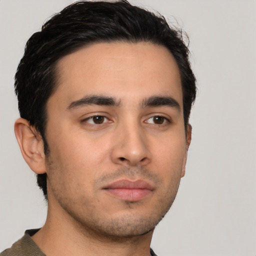 Neutral latino young-adult male with short  black hair and brown eyes