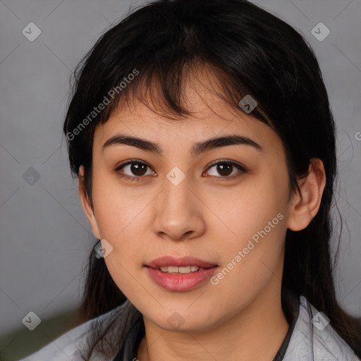 Joyful latino young-adult female with medium  black hair and brown eyes