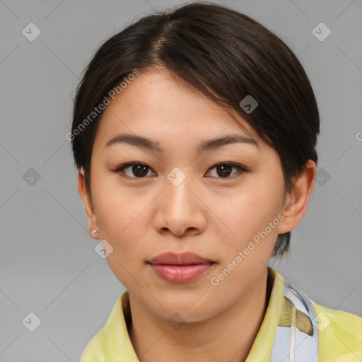 Joyful asian young-adult female with medium  brown hair and brown eyes