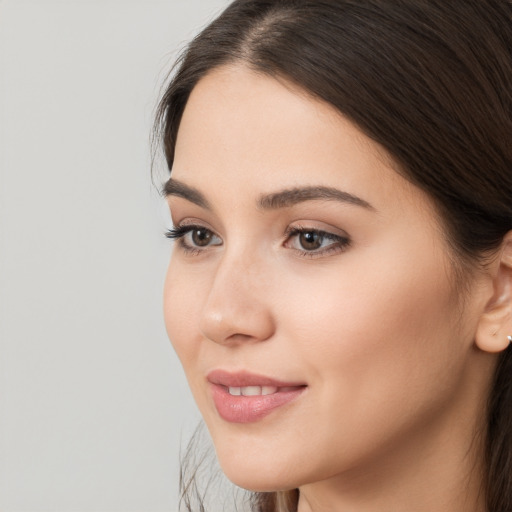 Neutral white young-adult female with long  brown hair and brown eyes