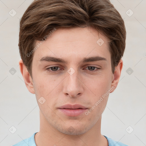 Neutral white young-adult male with short  brown hair and grey eyes