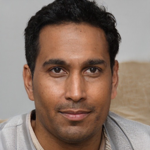 Neutral black young-adult male with short  brown hair and brown eyes