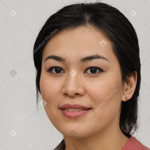 Joyful asian young-adult female with medium  brown hair and brown eyes