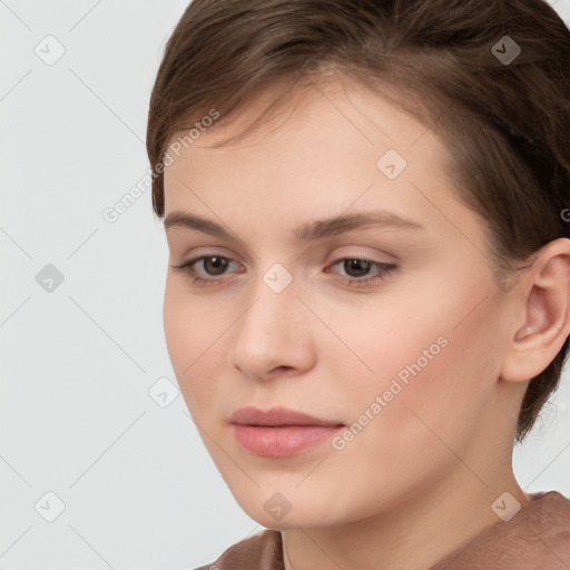 Neutral white young-adult female with short  brown hair and brown eyes