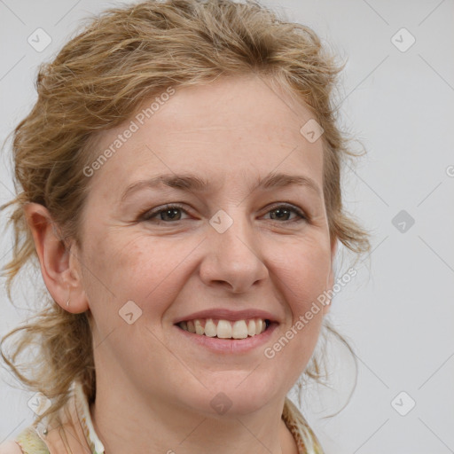 Joyful white young-adult female with medium  brown hair and blue eyes