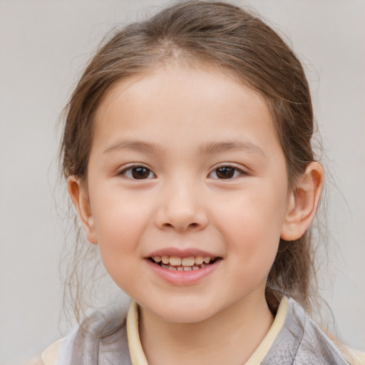 Joyful white child female with medium  brown hair and brown eyes