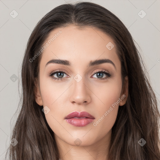 Neutral white young-adult female with long  brown hair and brown eyes