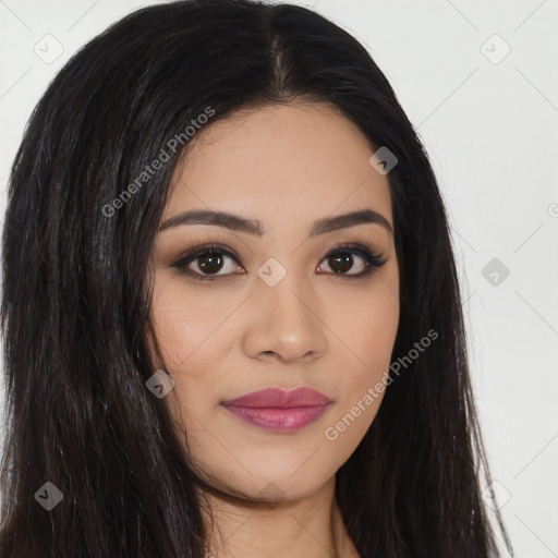 Joyful latino young-adult female with long  brown hair and brown eyes