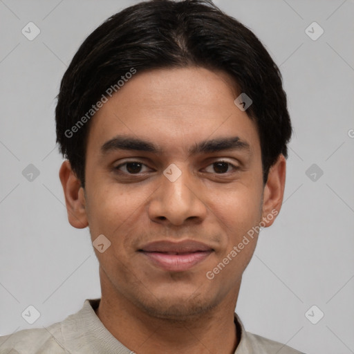 Joyful latino young-adult male with short  black hair and brown eyes