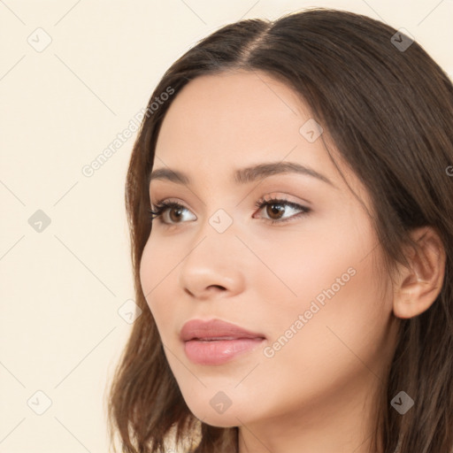 Neutral white young-adult female with long  brown hair and brown eyes