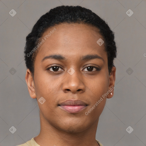 Joyful black young-adult female with short  black hair and brown eyes