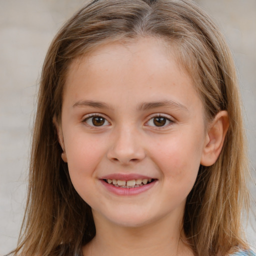 Joyful white child female with long  brown hair and brown eyes