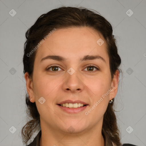 Joyful white young-adult female with medium  brown hair and grey eyes