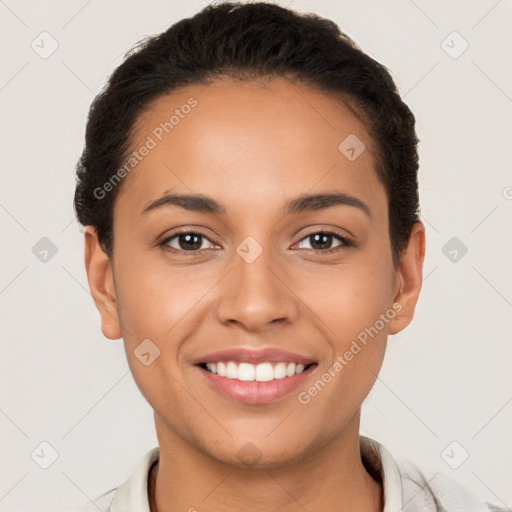 Joyful latino young-adult female with short  brown hair and brown eyes