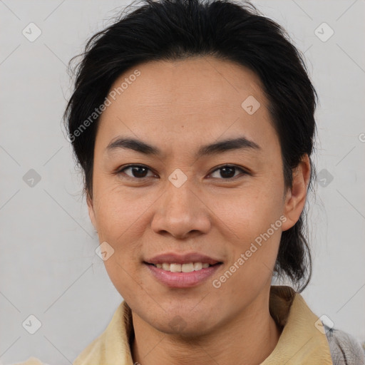 Joyful latino young-adult female with medium  brown hair and brown eyes