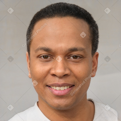 Joyful latino young-adult male with short  black hair and brown eyes