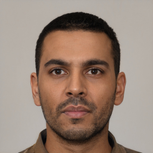Neutral latino young-adult male with short  black hair and brown eyes