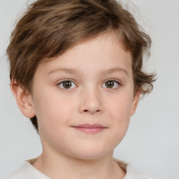 Joyful white child female with short  brown hair and brown eyes